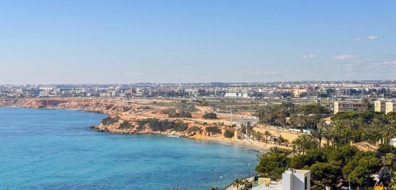 Sale - Apartment / flat -
Punta Prima