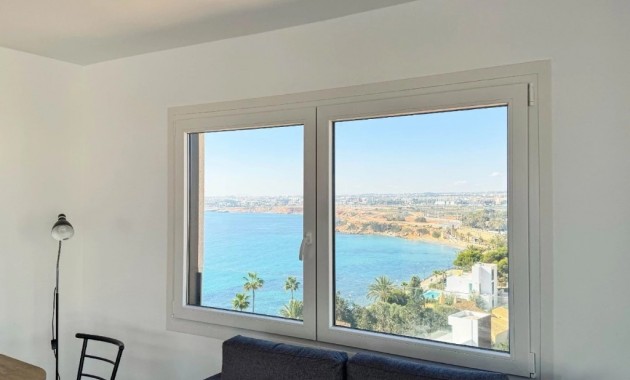 Sale - Apartment / flat -
Punta Prima