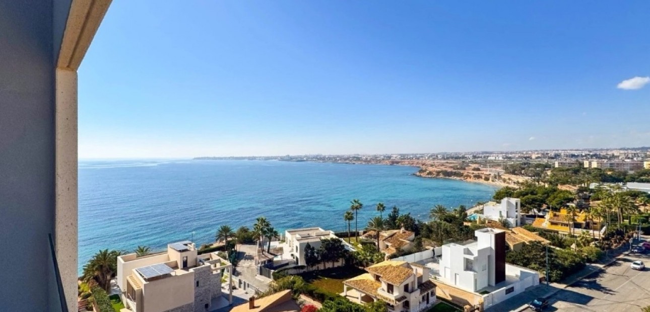 Sale - Apartment / flat -
Punta Prima