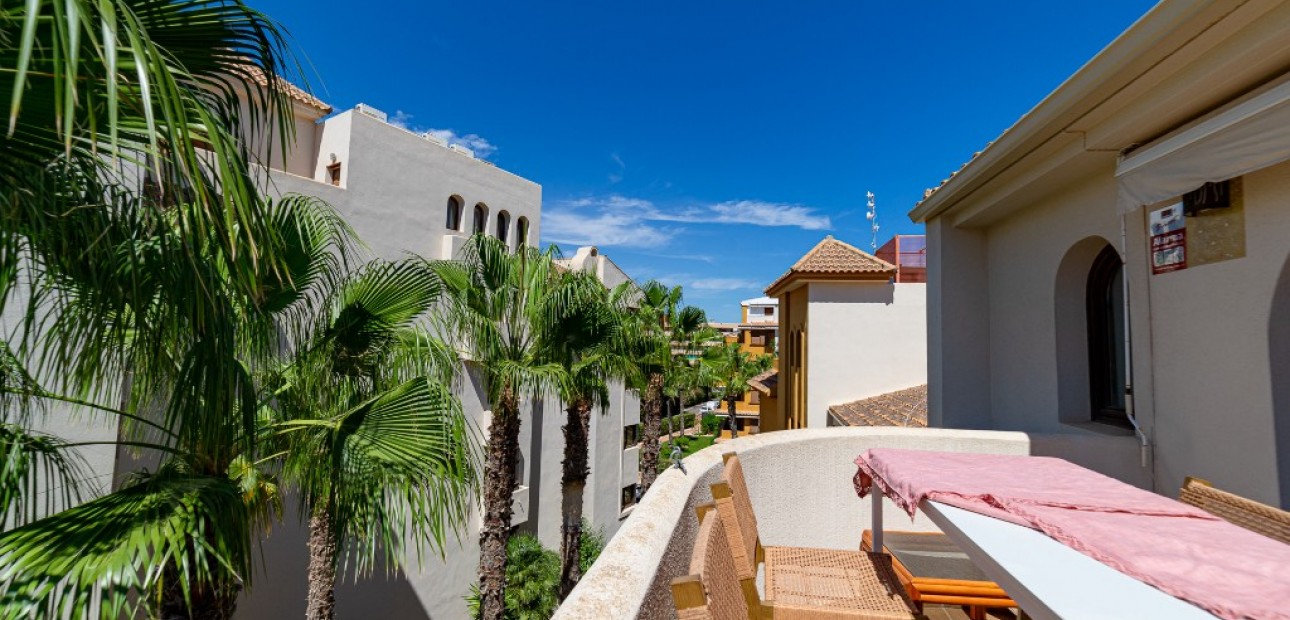 Sale - Apartment / flat -
Punta Prima