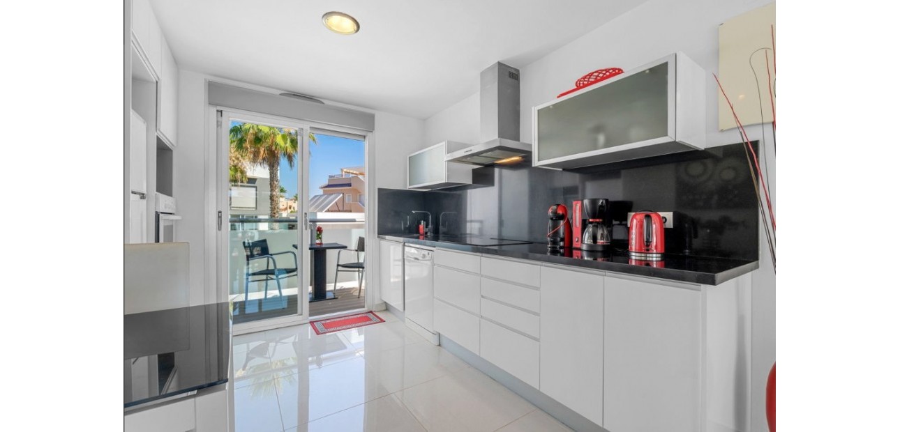 Sale - Apartment / flat -
Punta Prima