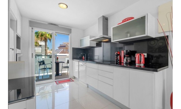 Sale - Apartment / flat -
Punta Prima