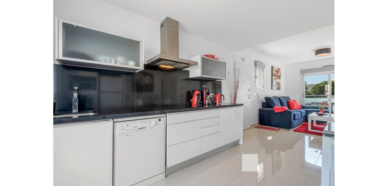Sale - Apartment / flat -
Punta Prima