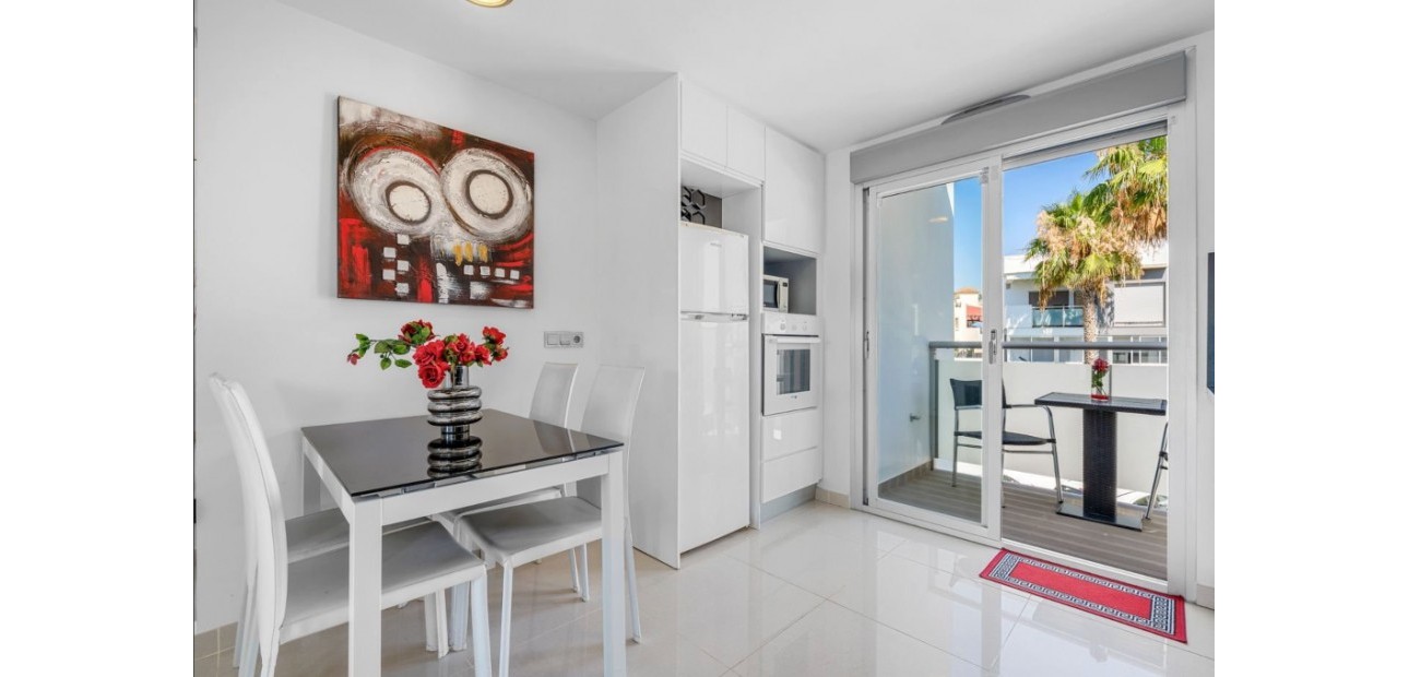 Sale - Apartment / flat -
Punta Prima