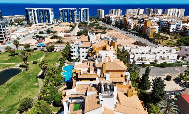 Sale - Apartment / flat -
Punta Prima