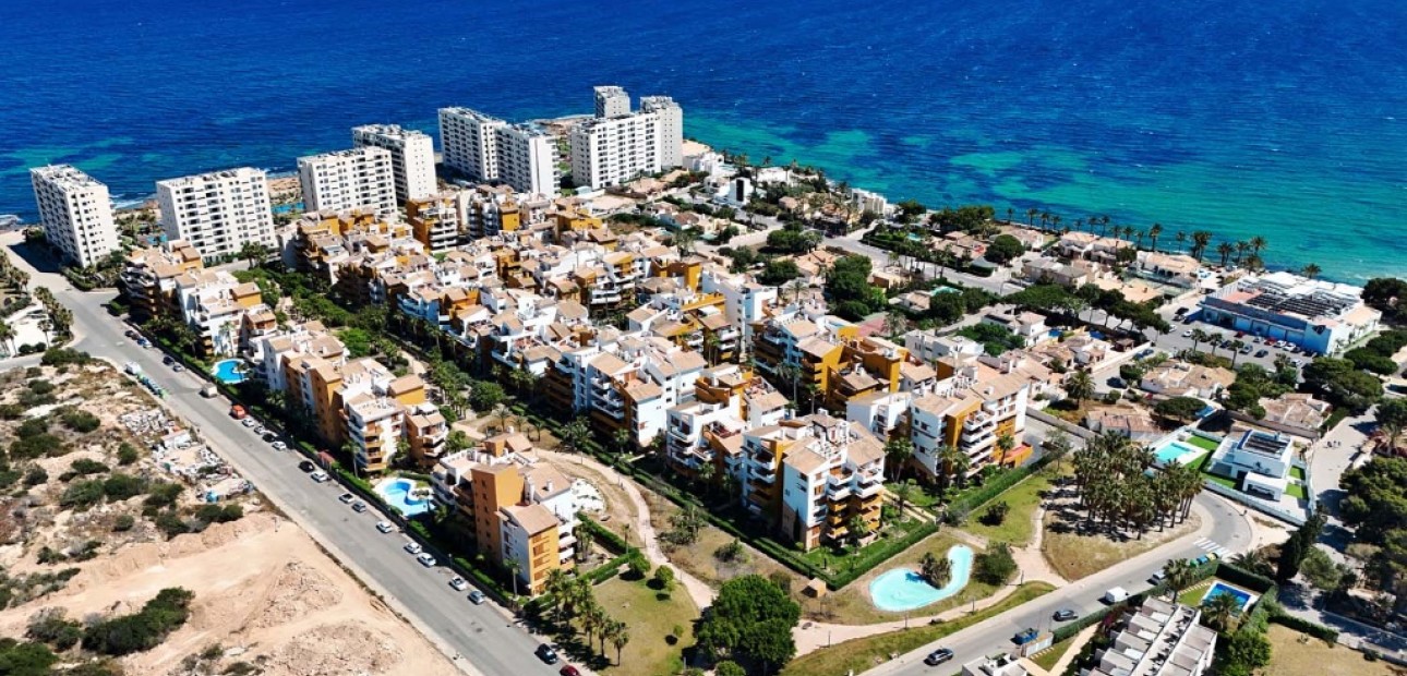 Sale - Apartment / flat -
Punta Prima