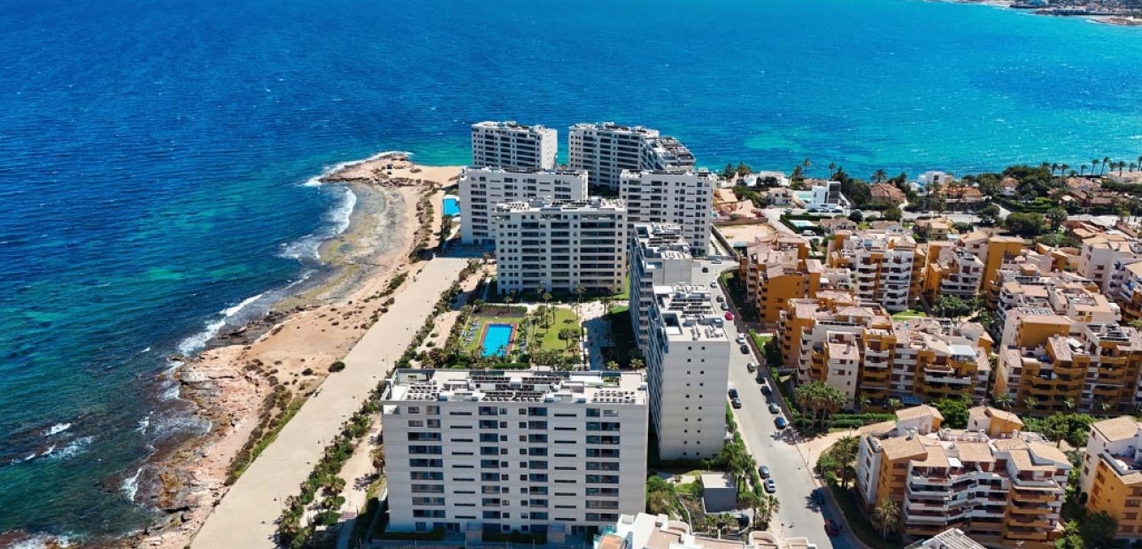 Sale - Apartment / flat -
Punta Prima