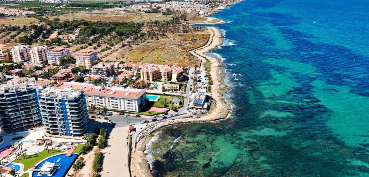 Sale - Apartment / flat -
Punta Prima