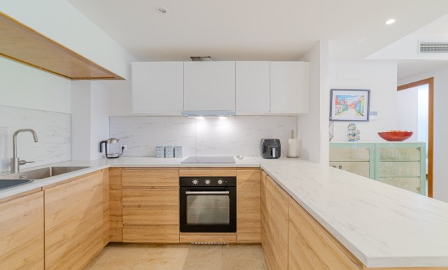 Sale - Apartment / flat -
Punta Prima