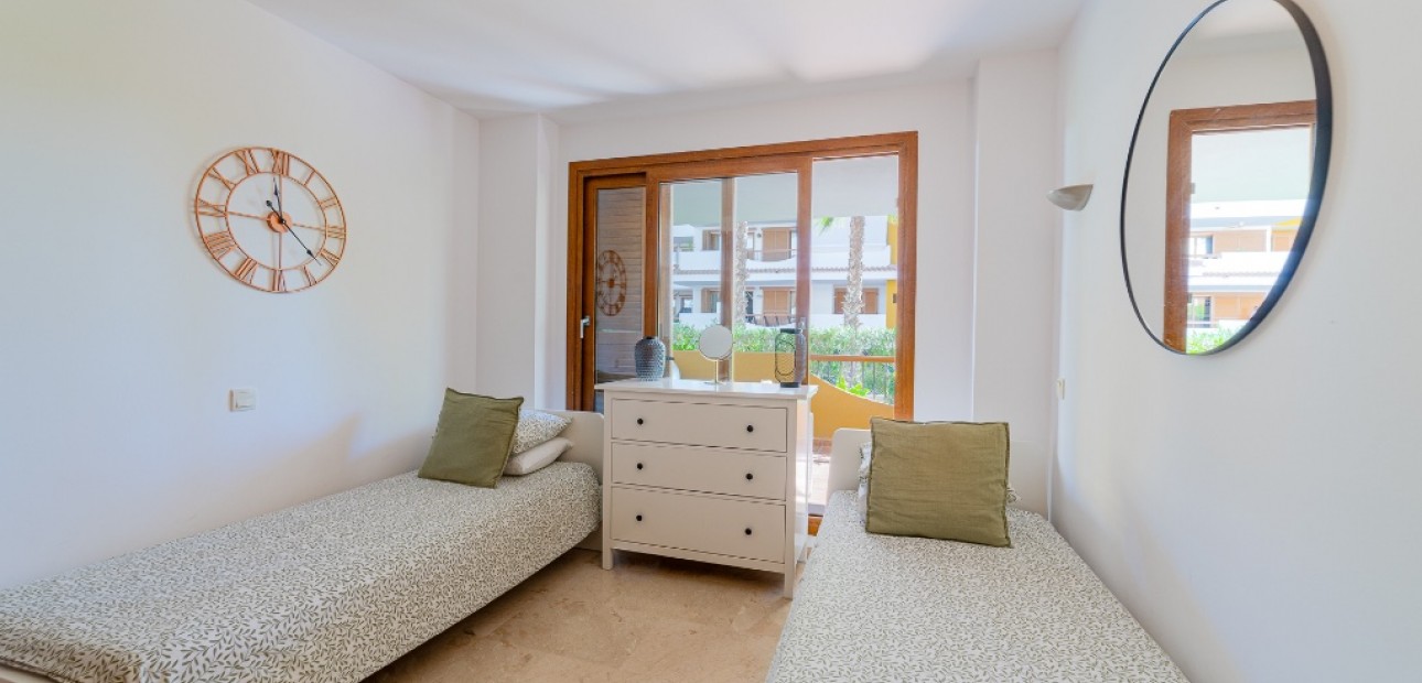 Sale - Apartment / flat -
Punta Prima