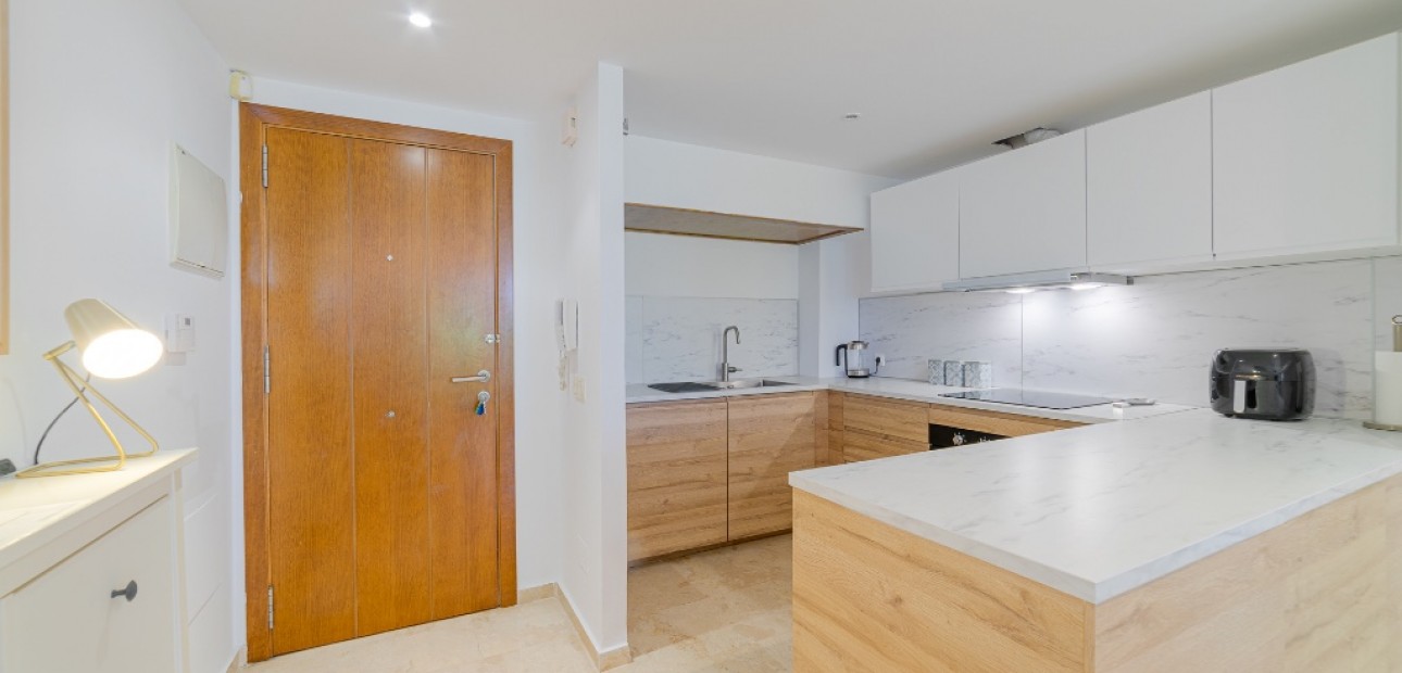 Sale - Apartment / flat -
Punta Prima