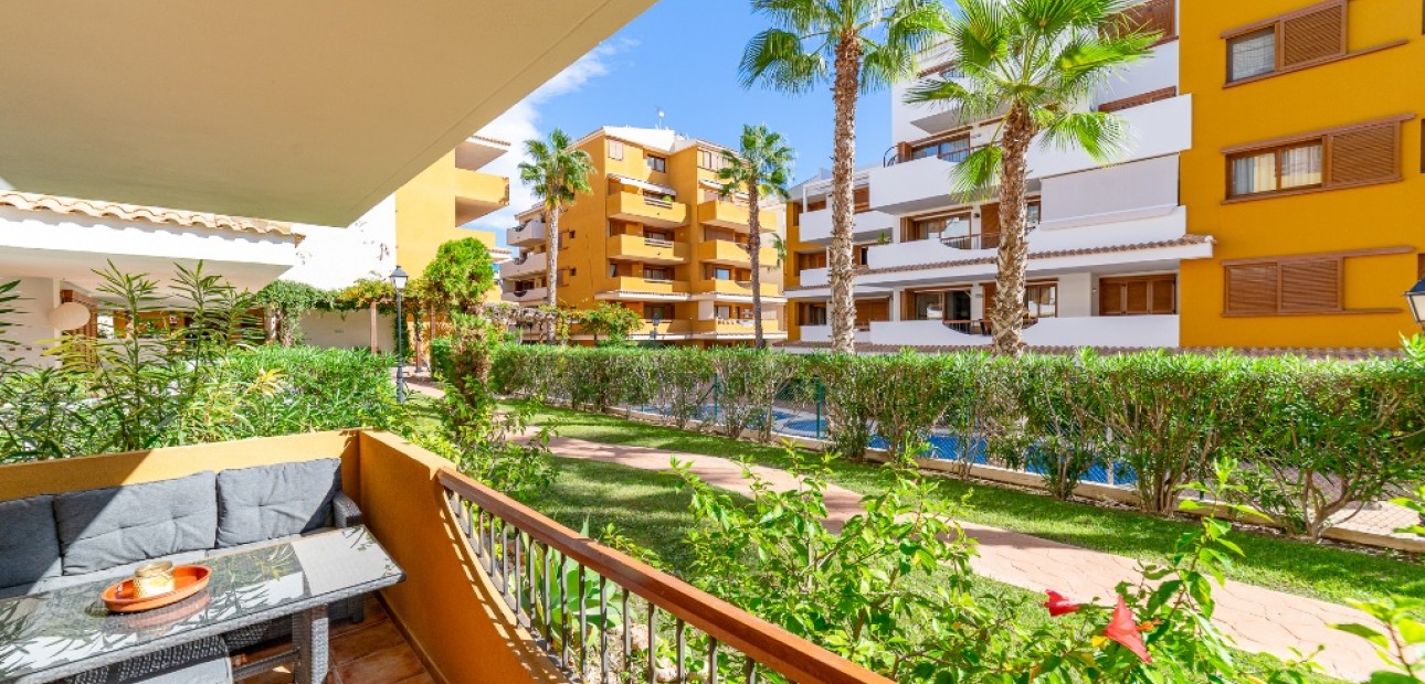 Sale - Apartment / flat -
Punta Prima