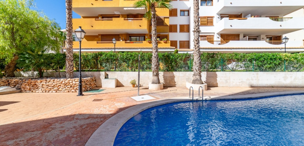 Sale - Apartment / flat -
Punta Prima