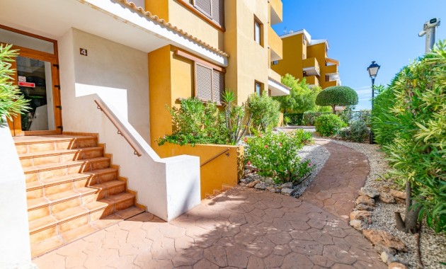 Sale - Apartment / flat -
Punta Prima