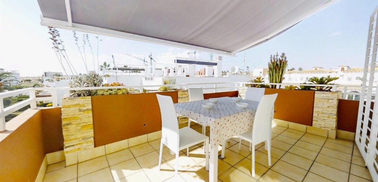 Sale - Apartment / flat -
Punta Prima