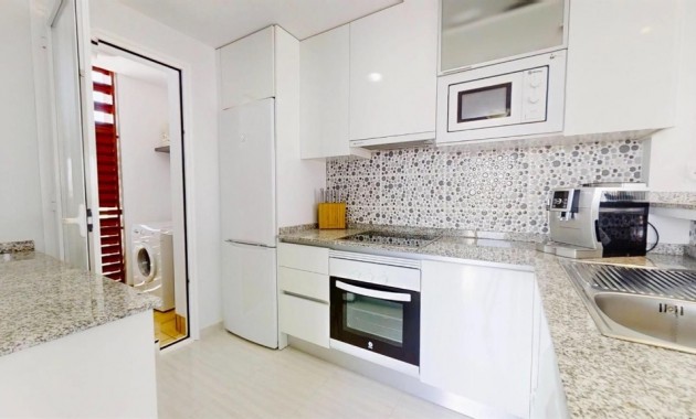 Sale - Apartment / flat -
Punta Prima