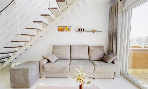 Sale - Apartment / flat -
Punta Prima