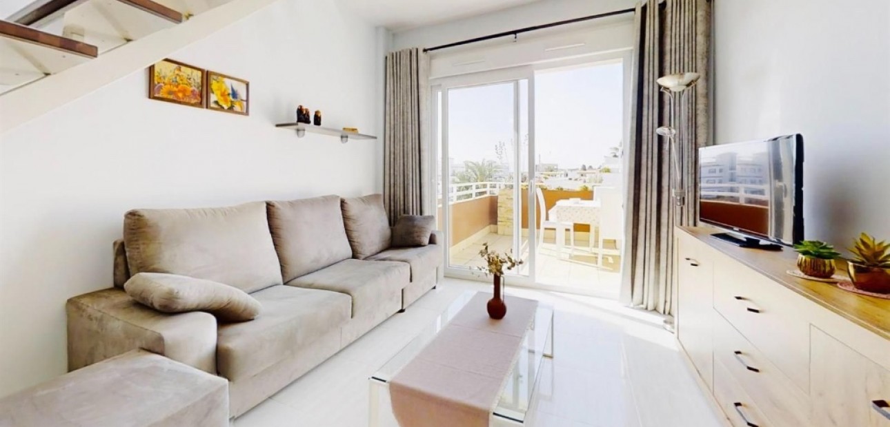 Sale - Apartment / flat -
Punta Prima