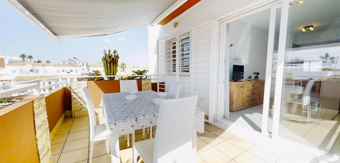 Sale - Apartment / flat -
Punta Prima