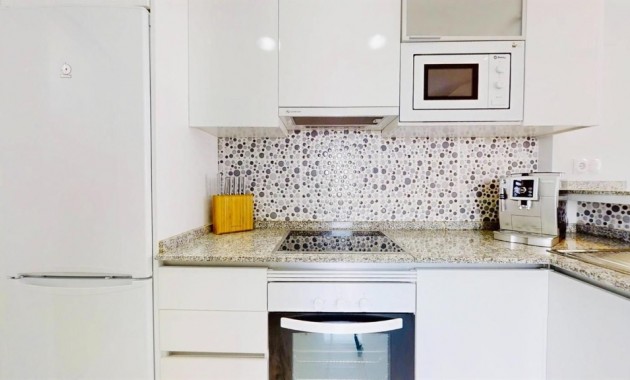 Sale - Apartment / flat -
Punta Prima