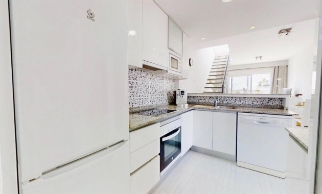 Sale - Apartment / flat -
Punta Prima