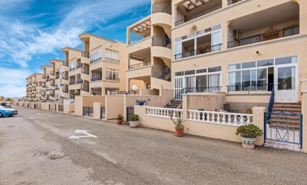 Sale - Apartment / flat -
Punta Prima