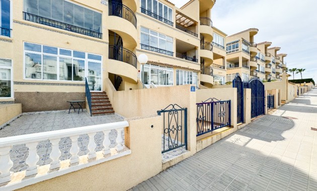 Sale - Apartment / flat -
Punta Prima