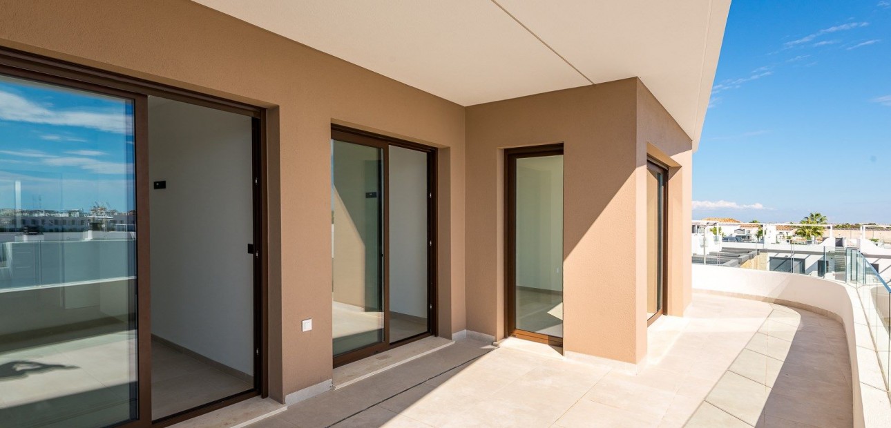 Sale - Apartment / flat -
Punta Prima