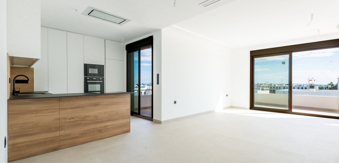 Sale - Apartment / flat -
Punta Prima