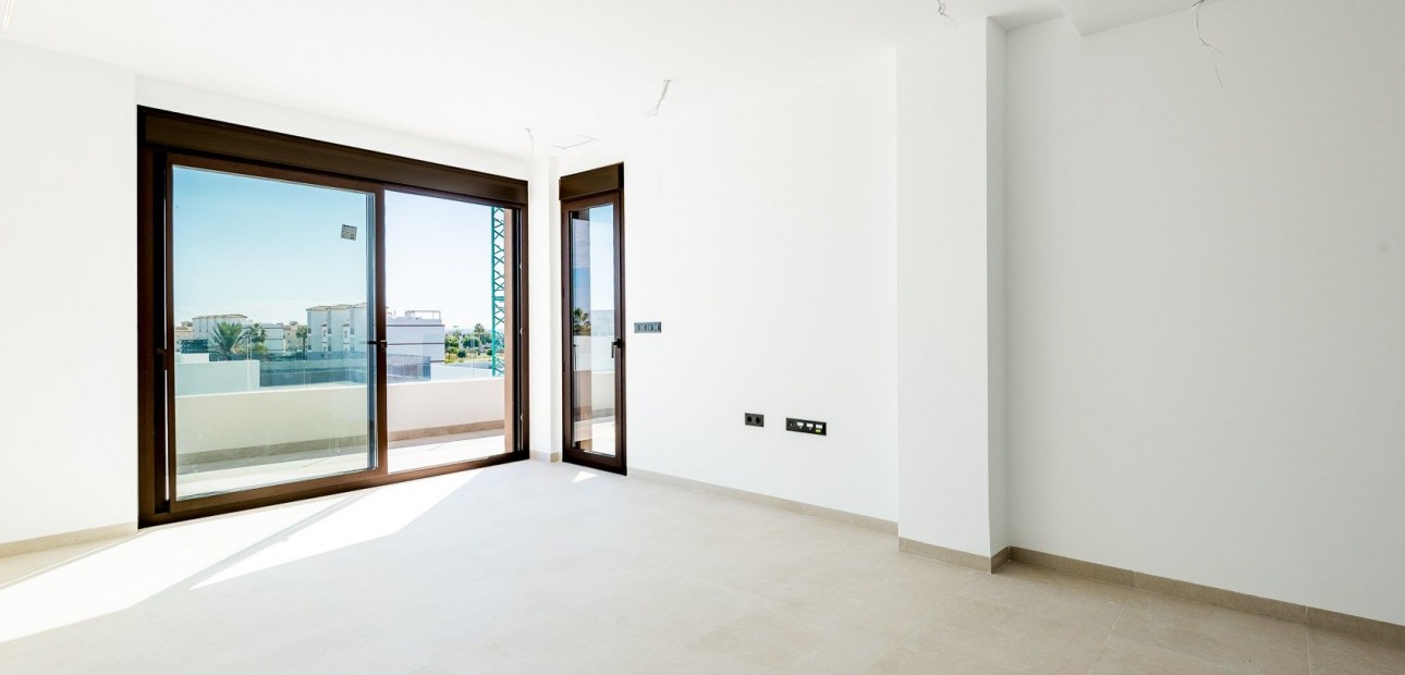 Sale - Apartment / flat -
Punta Prima